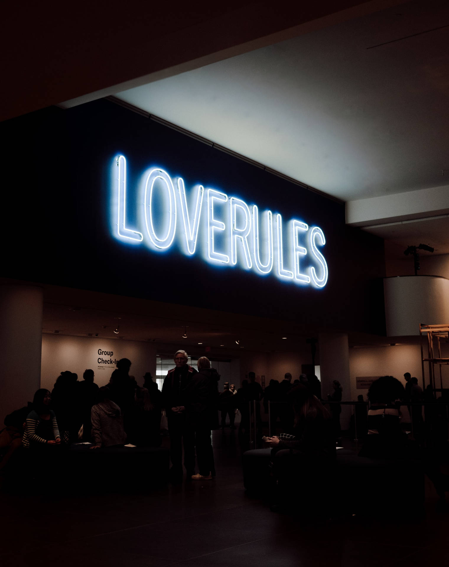 LOVERULES Signage In Neon Blue iPhone Wallpaper