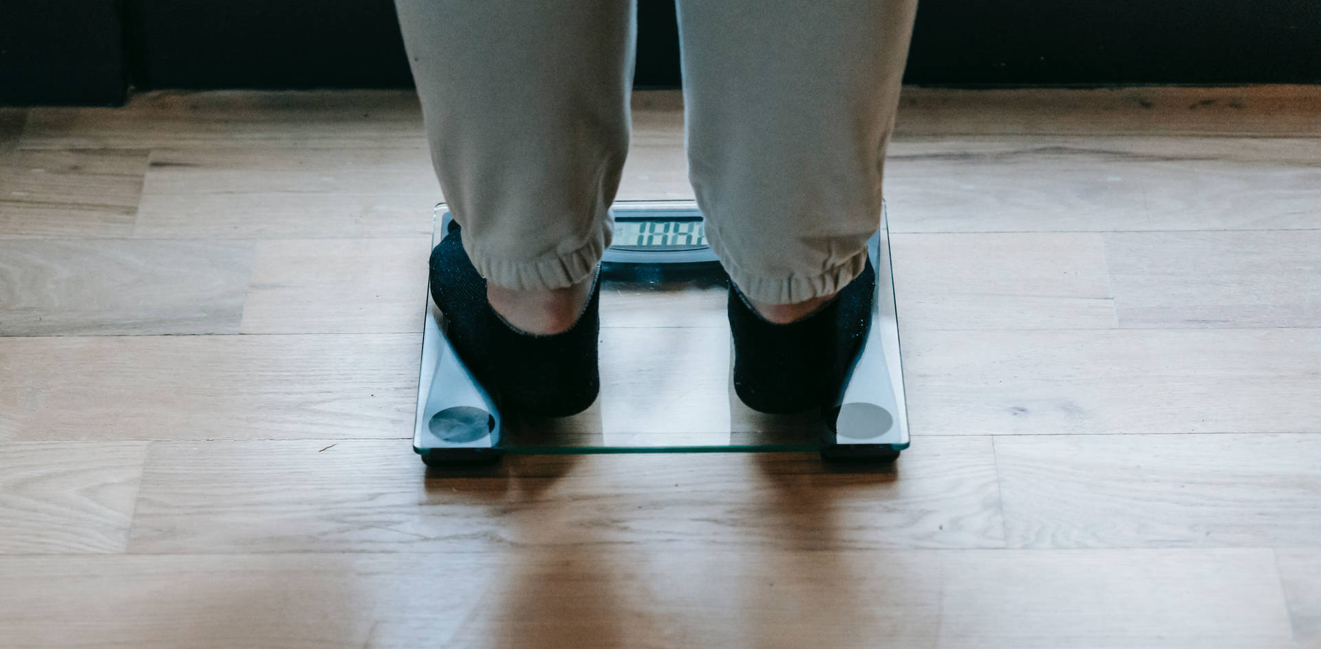Lower Body Stepping On Scale Wallpaper