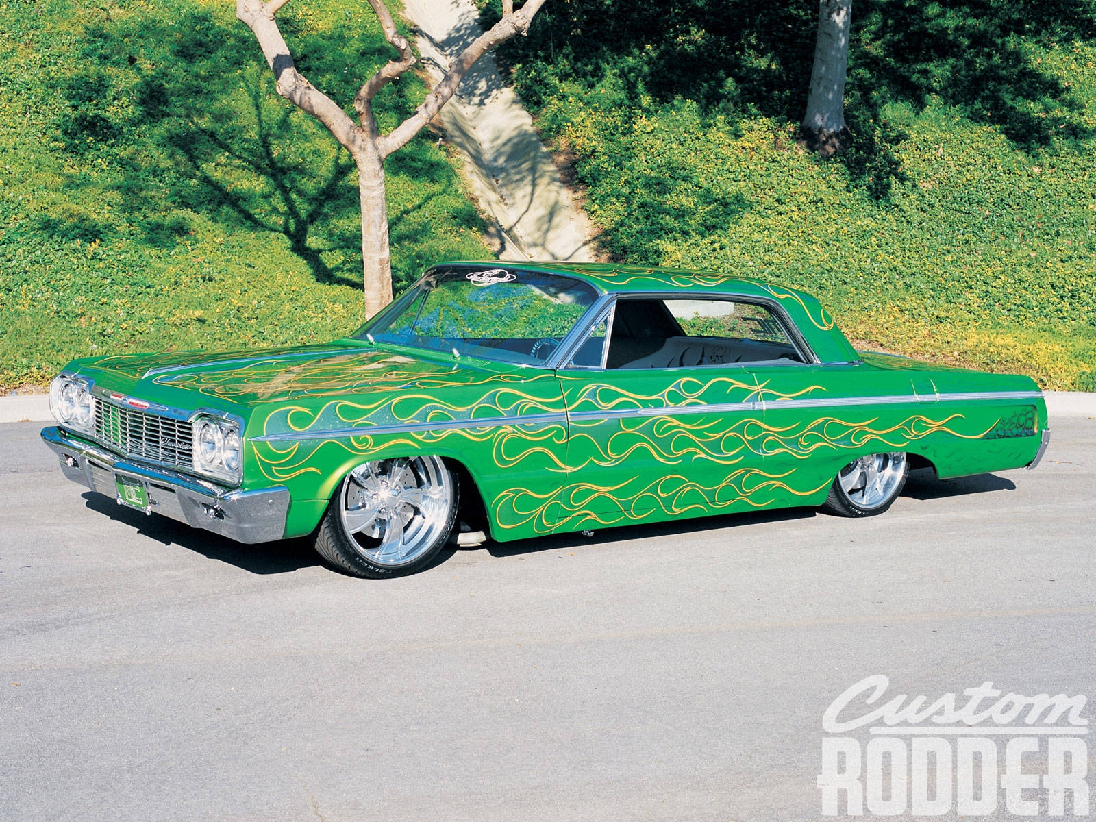 Lowrider Green Impala With Fiery Decals Wallpaper