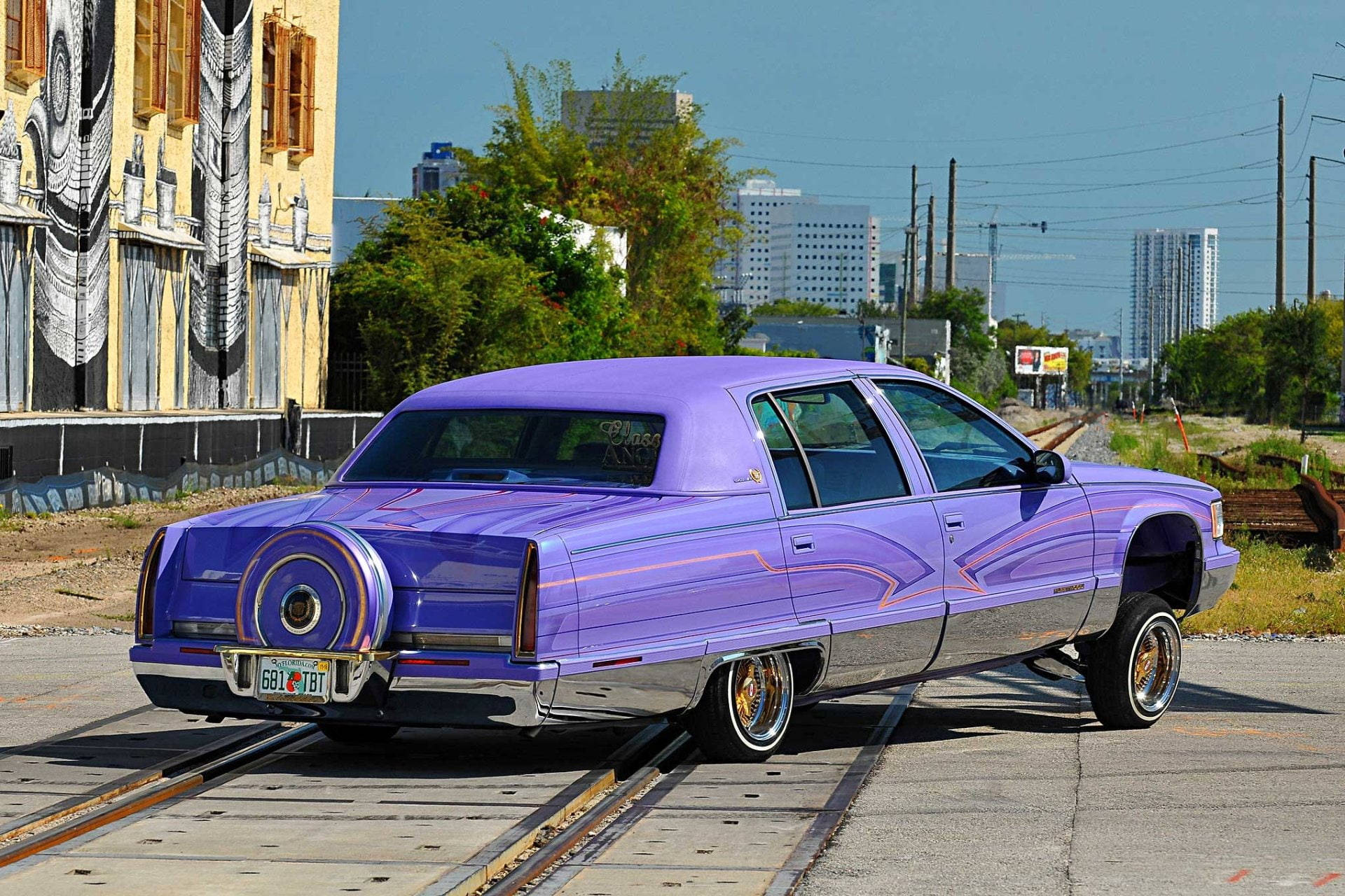 Lowrider Purple Cadillac Fleetwood Wallpaper