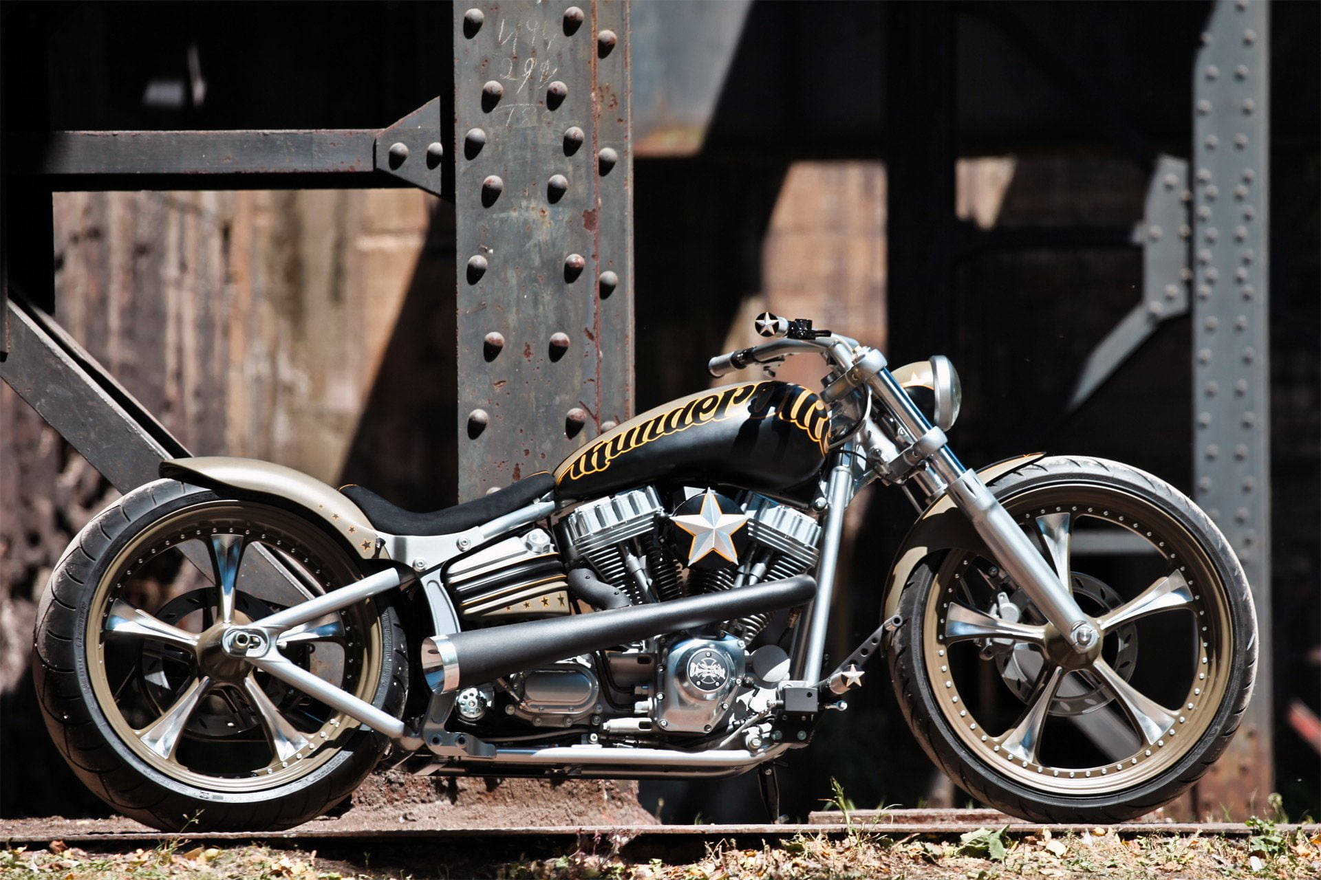 Download Classic Bobber Motorcycle Showcasing Its Lowrider Wheel