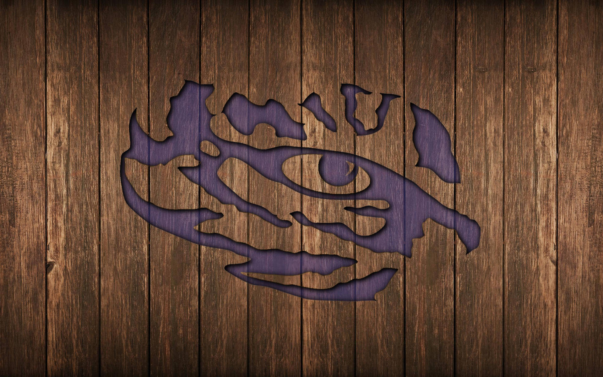 A Purple Logo On A Wooden Background Wallpaper