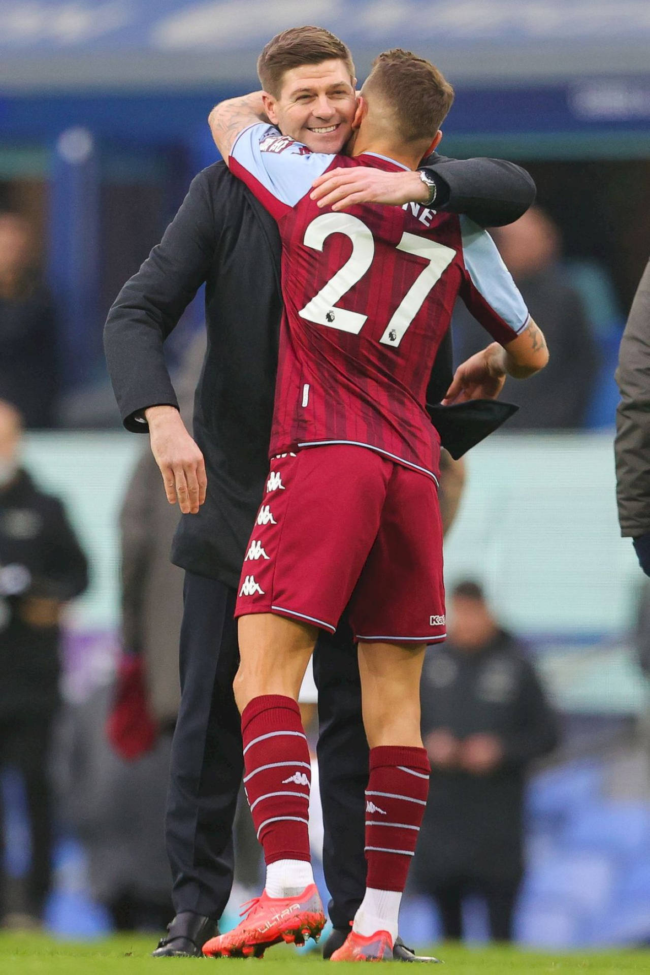 Lucas Digne And Steven Gerrard Hug Wallpaper