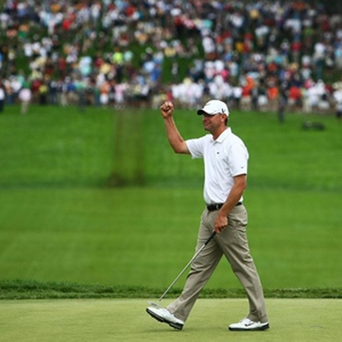 "Lucas Glover Celebrating Victory with Enthusiastic Fist Pump" Wallpaper