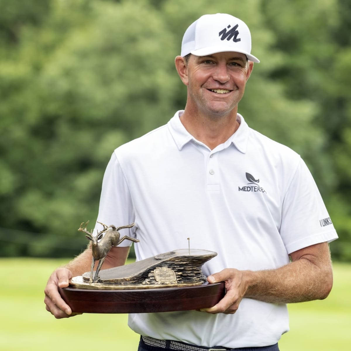 Lucas Glover Happily Holding Trophy Wallpaper