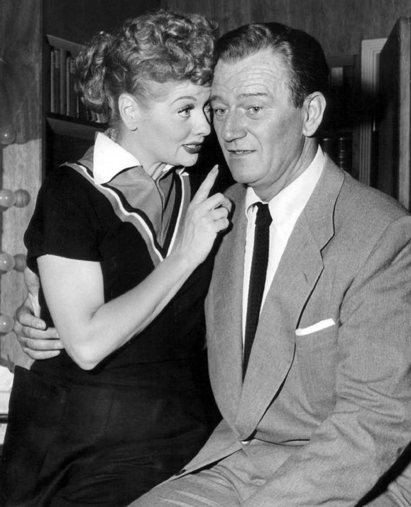 Lucille Ball Whispering To John Wayne Wallpaper
