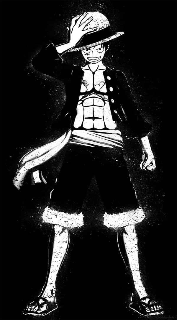 Luffy the Pirate King against a black and white background Wallpaper