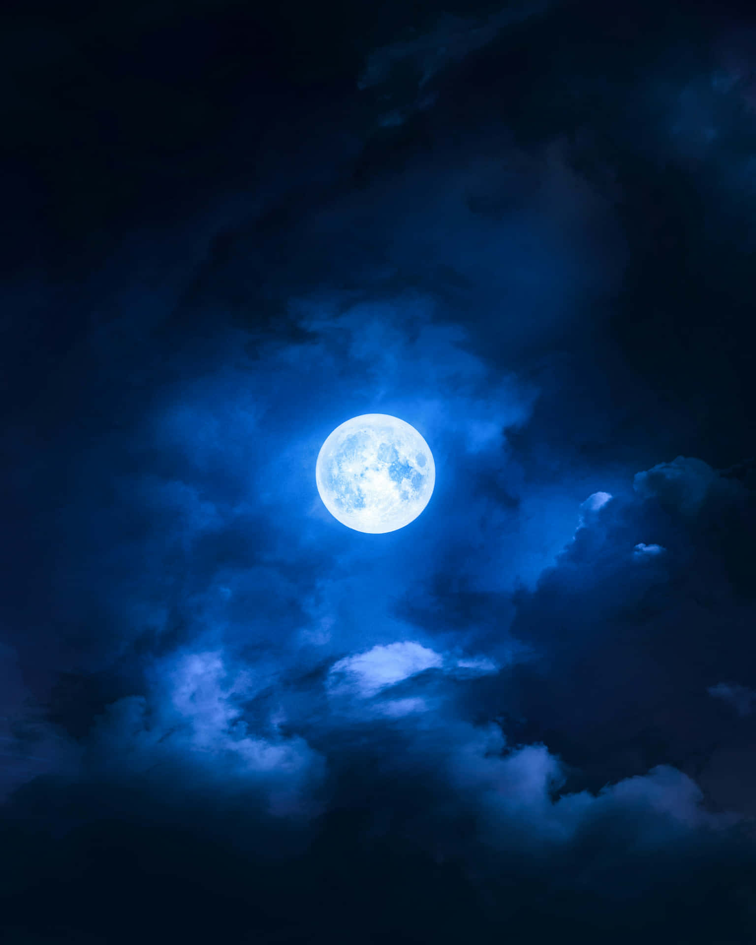 Luminous_ Blue_ Moon_ Among_ Clouds.jpg Wallpaper