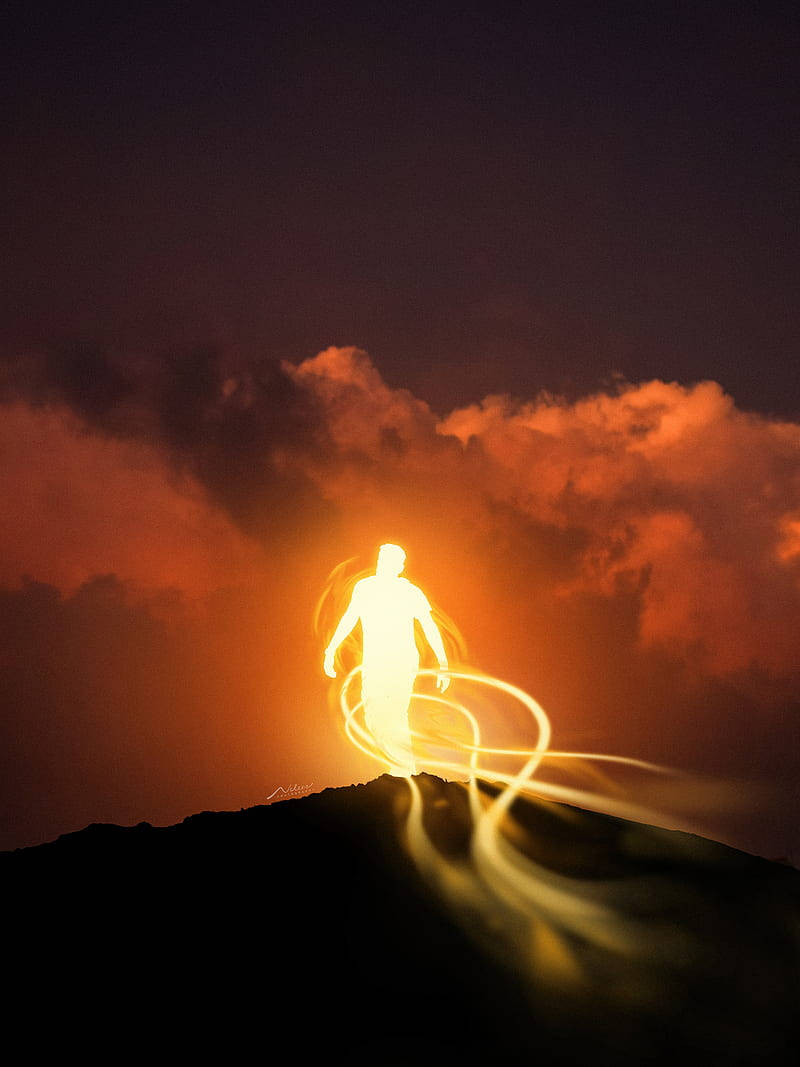 Luminous Man Soul On Mountain Wallpaper