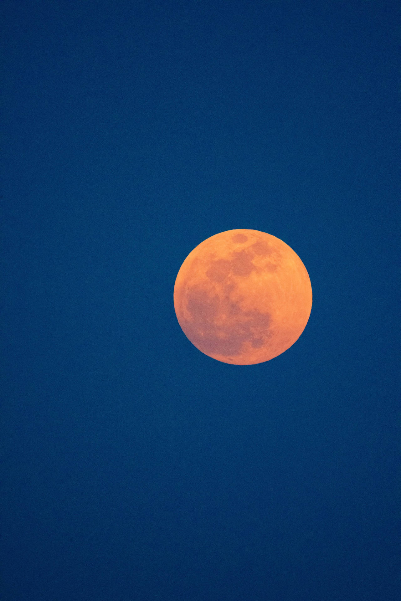Luna orange måne blå himmel Wallpaper