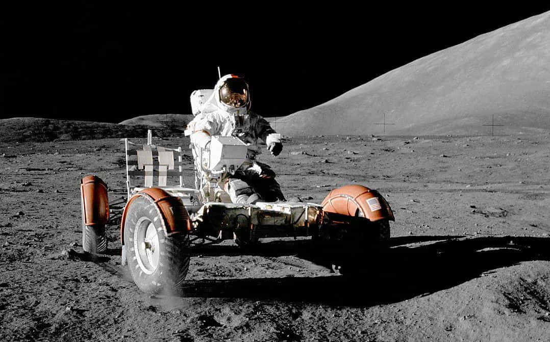 Astronaut Exploring with Lunar Rover Wallpaper