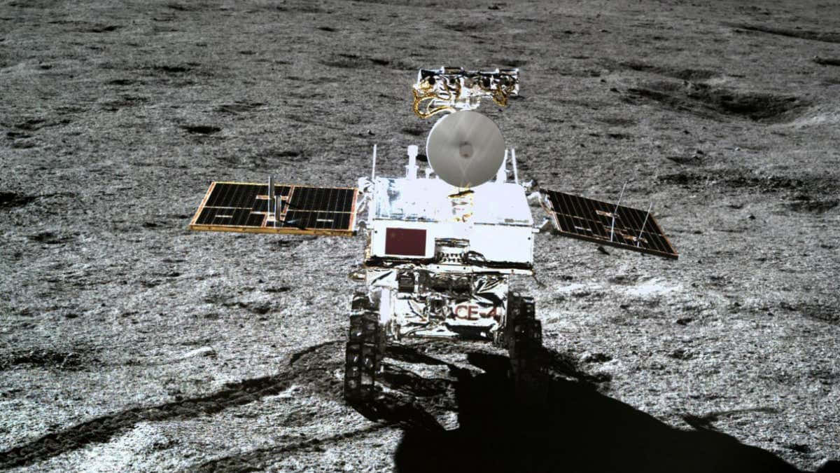 Lunar Rover Exploration on Moon's Surface Wallpaper