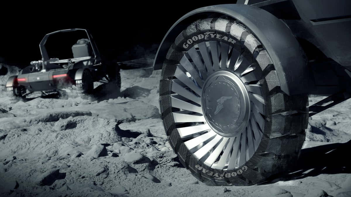 Vehículolunar Explorando La Superficie De La Luna Durante Una Misión Del Apolo. Fondo de pantalla