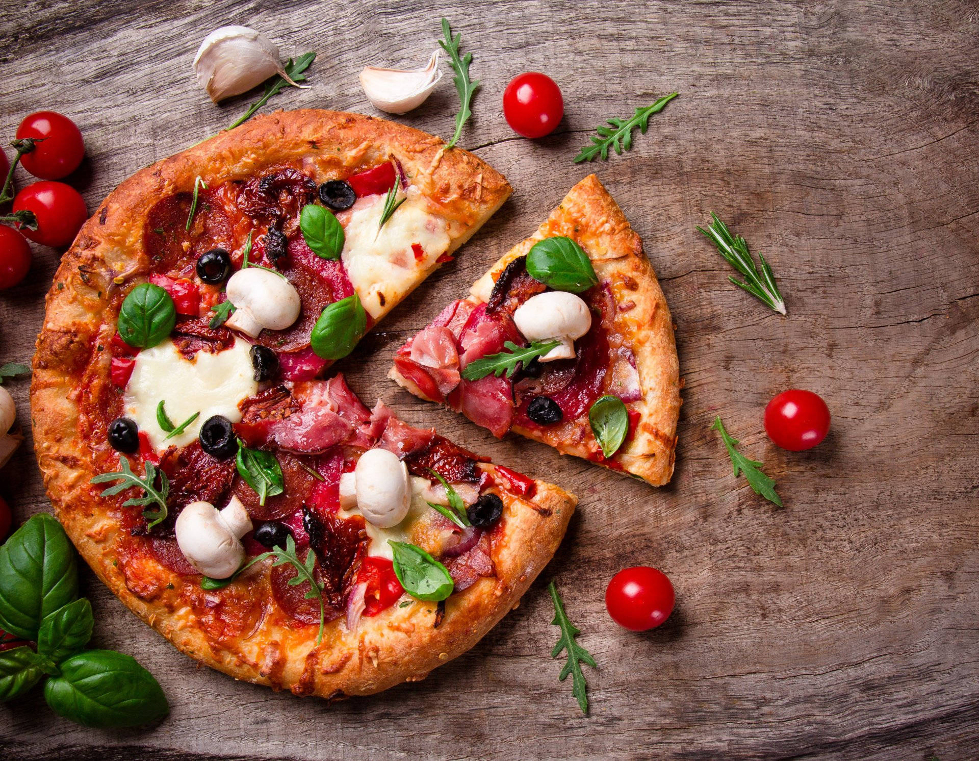 Lunch With Sliced Pizza And Cherry Tomatoes Wallpaper