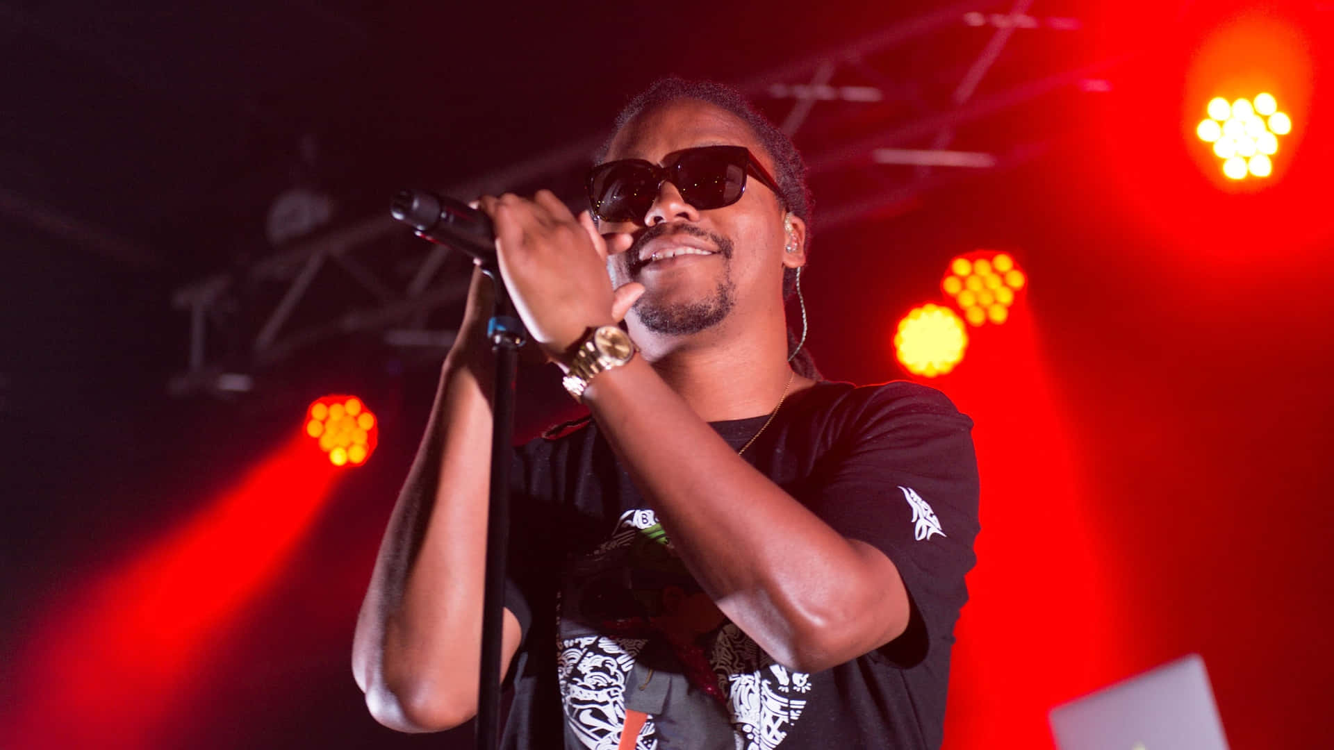 Lupe Fiasco Performing Liveon Stage Wallpaper