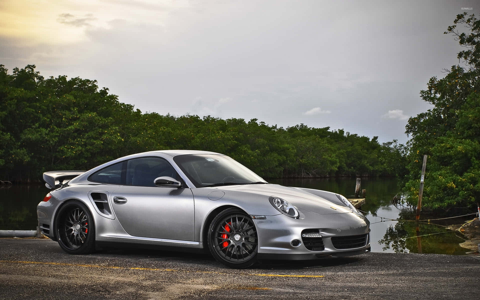 "luxurious Porsche 997 Gliding Through A Stunning Cityscape" Wallpaper