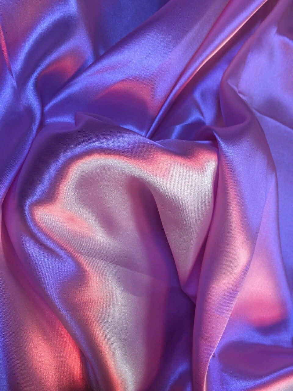 Luxurious Purple Silk Fabric Flowing In Wind Wallpaper
