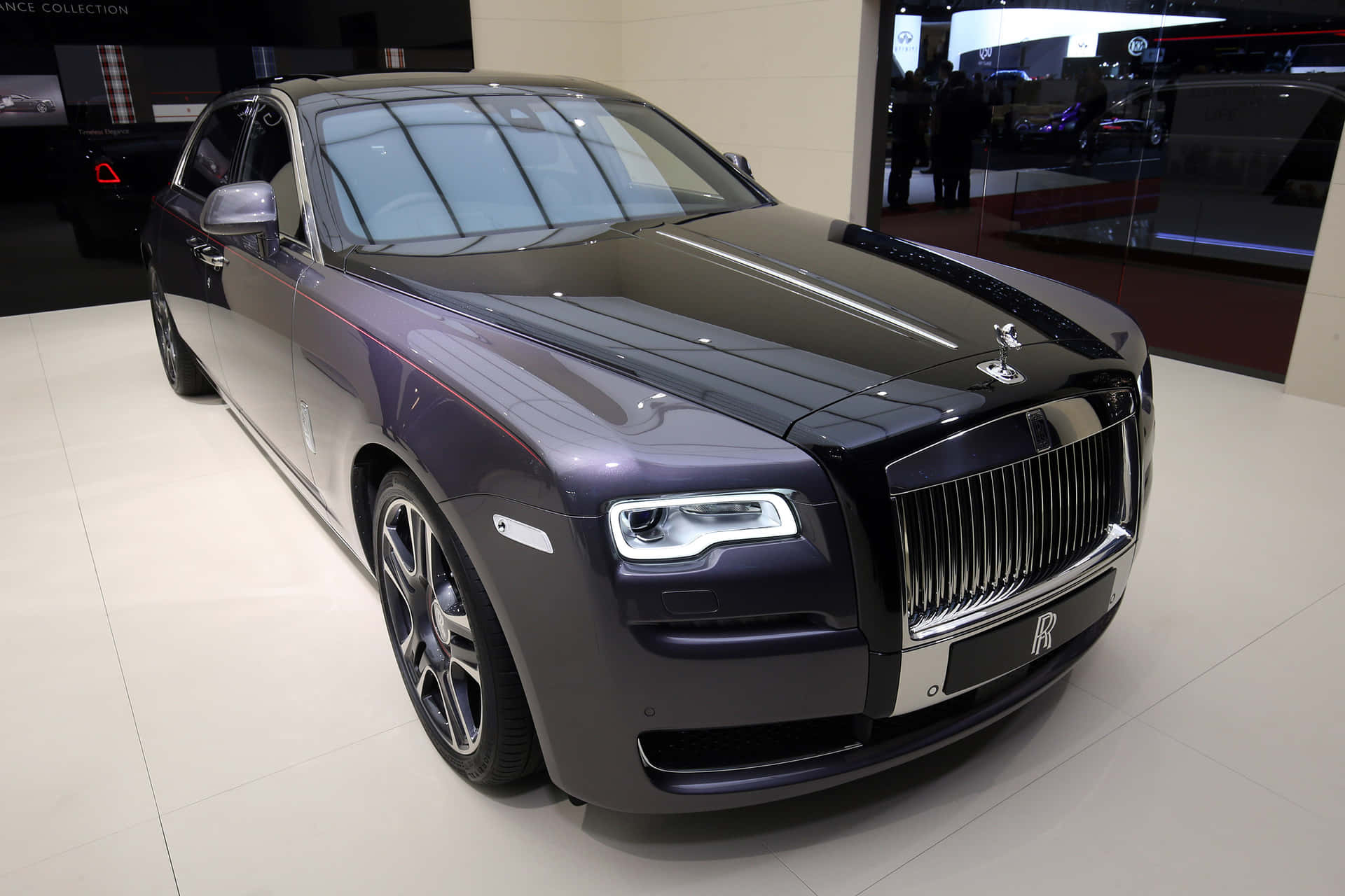 Luxurious Rolls Royce Ghost Under Moonlight Wallpaper