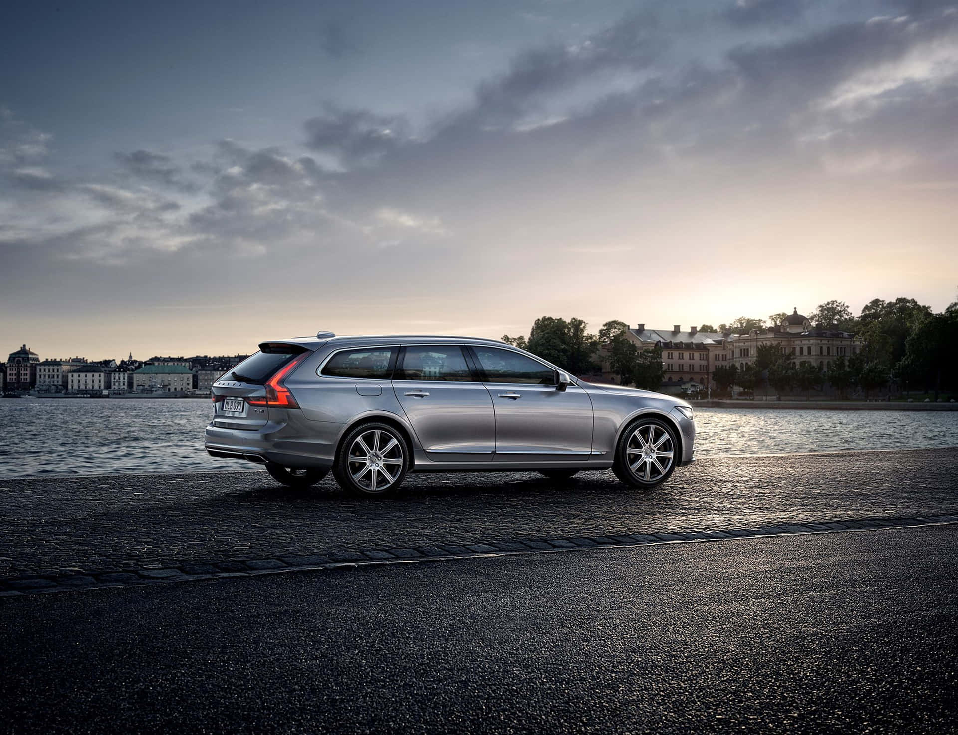 Luxurious Volvo V90 Cruising On A Scenic Route Wallpaper