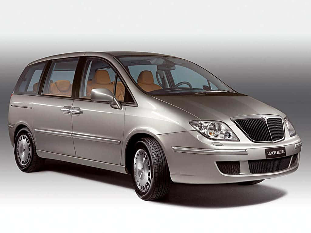 Luxury And Comfort: Lancia Phedra Excellence In Design Wallpaper