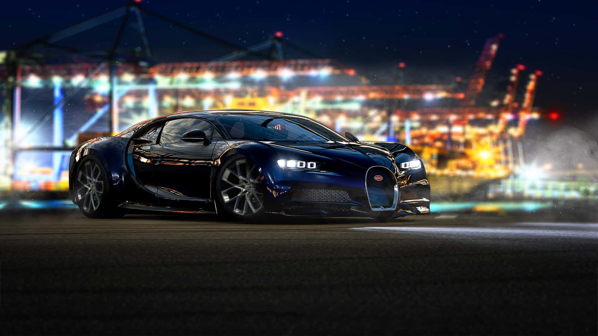 Luxury Sports Car Nighttime Cityscape Wallpaper