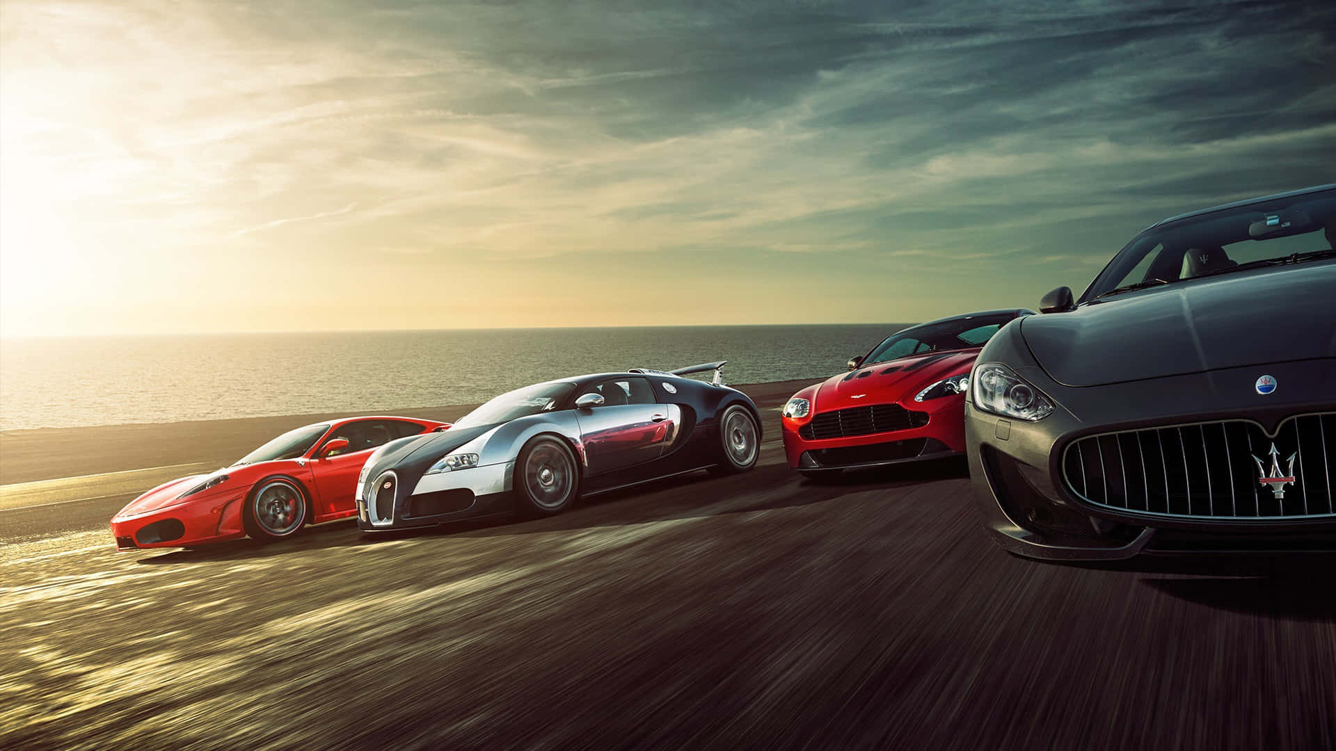 Luxury Sports Cars Sunset Drive Wallpaper