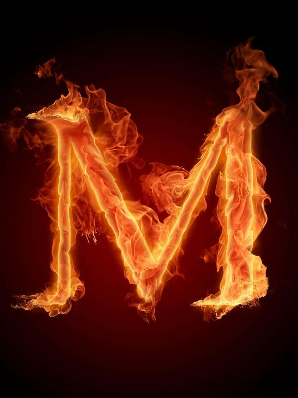 A Letter M Made Of Fire On A Black Background