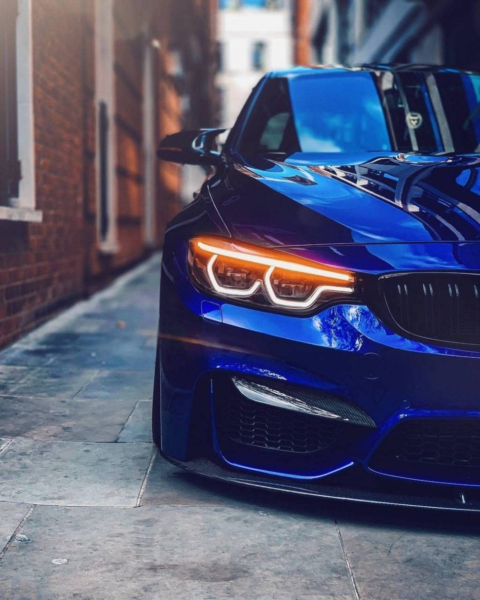 Caption: Stunning BMW M3 Model with Iphone X Wallpaper