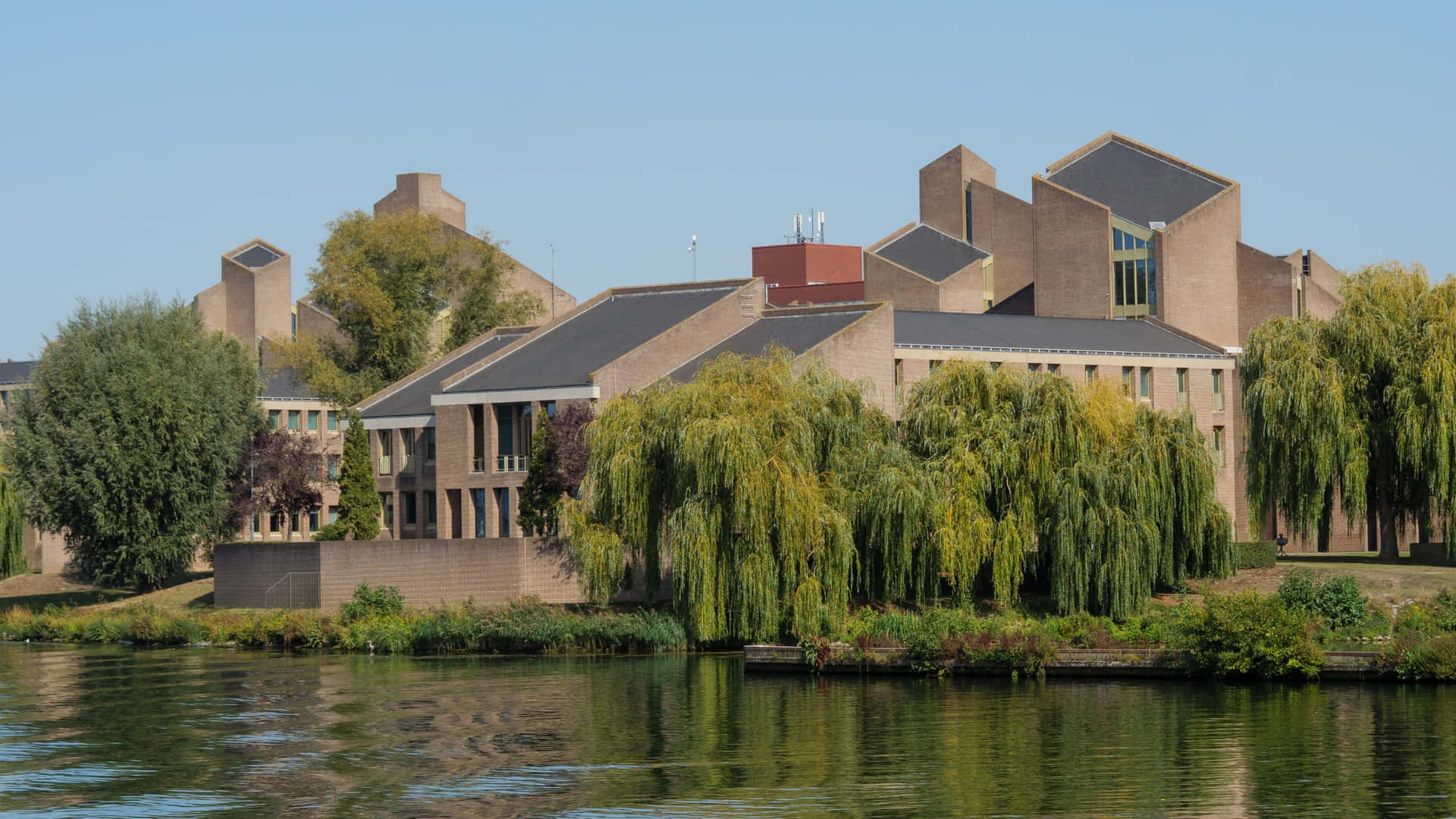 Download Maastricht Riverfront Building Wallpaper | Wallpapers.com