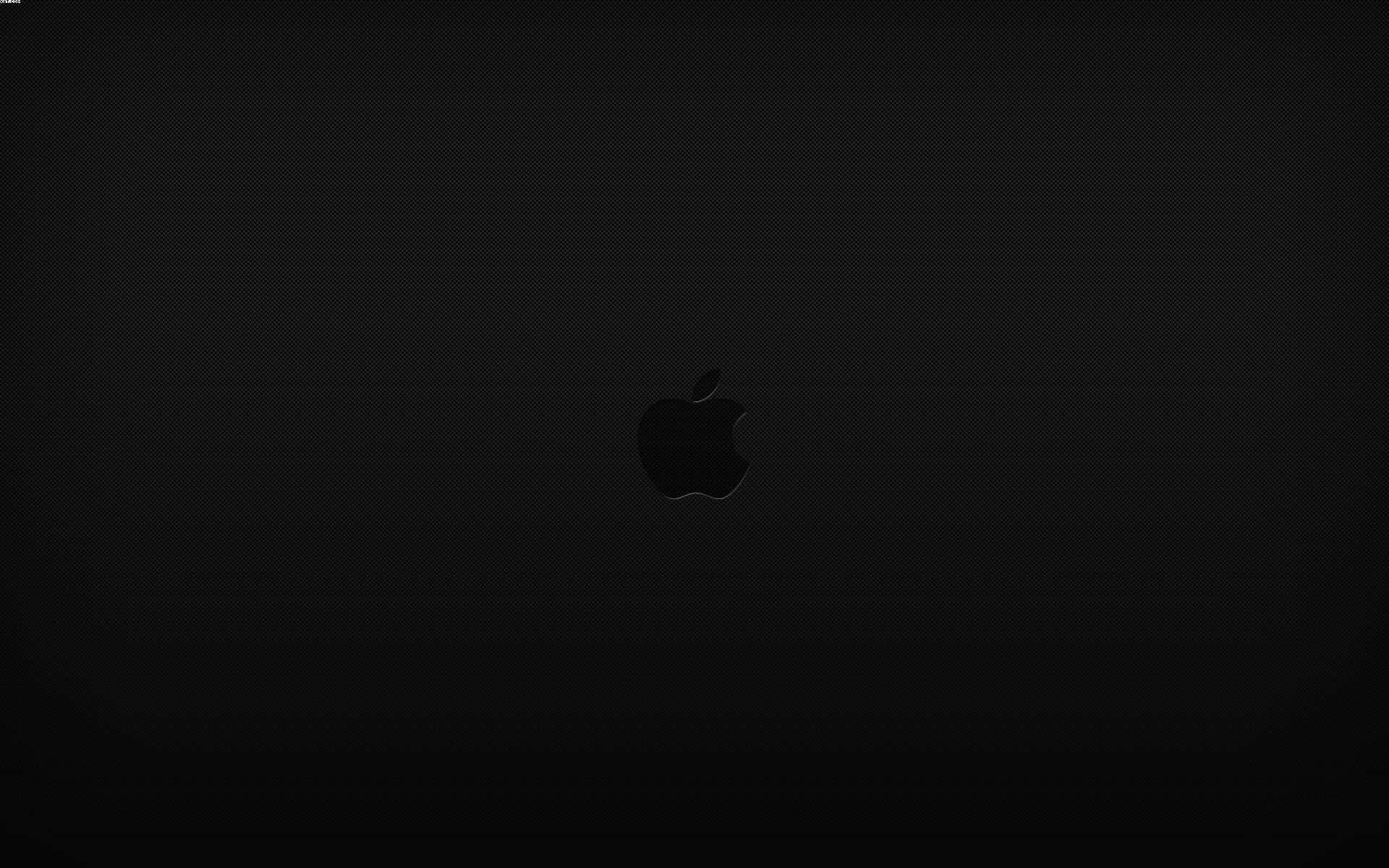 Einschwarzer Hintergrund Mit Einem Apple-logo Wallpaper
