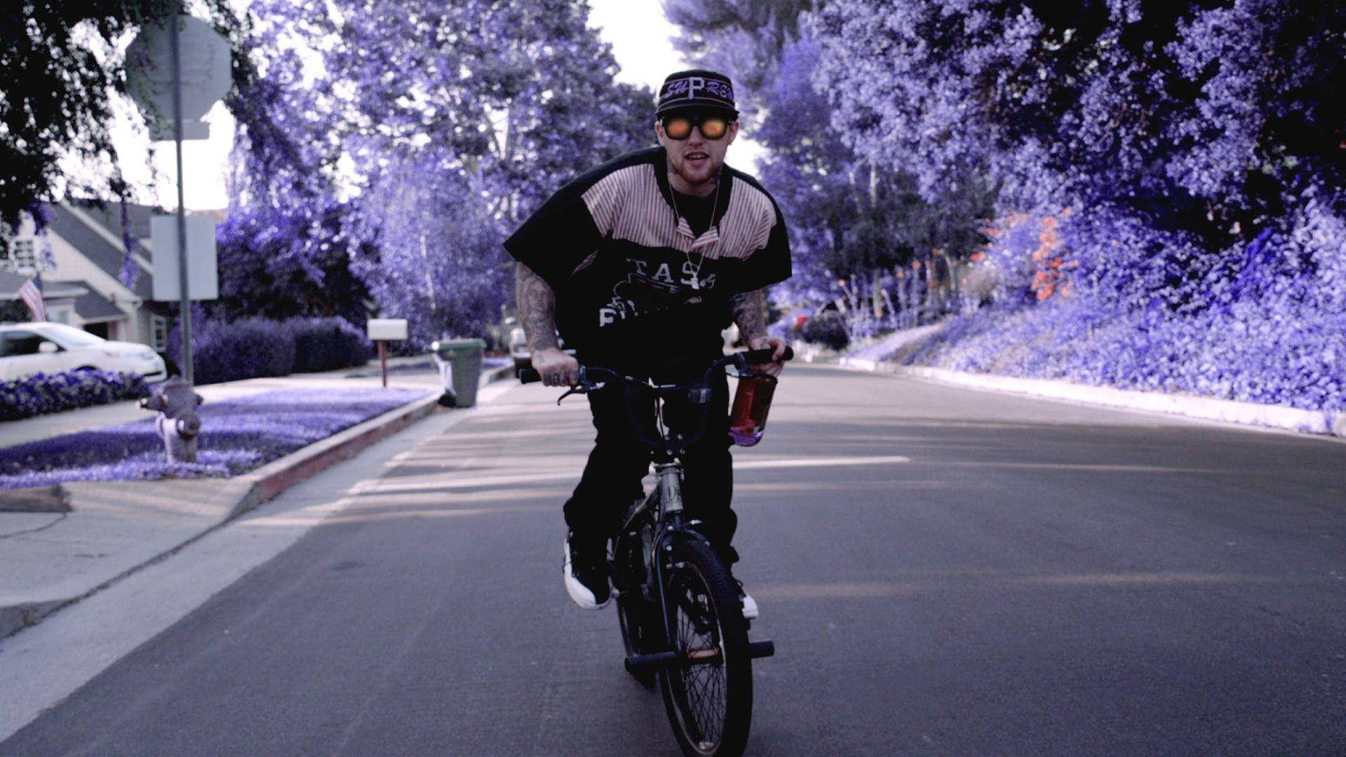 Mac Miller Riding Bicycle Wallpaper