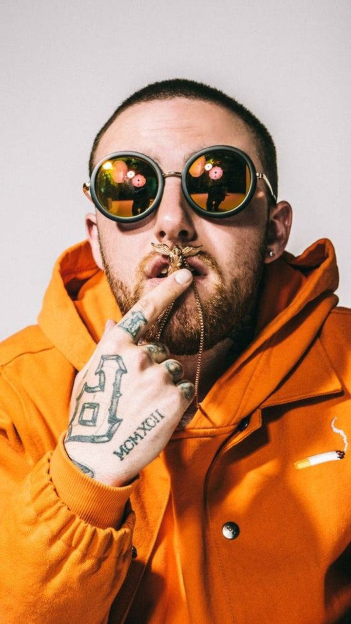 Mac Miller With Necklace On Mouth Wallpaper