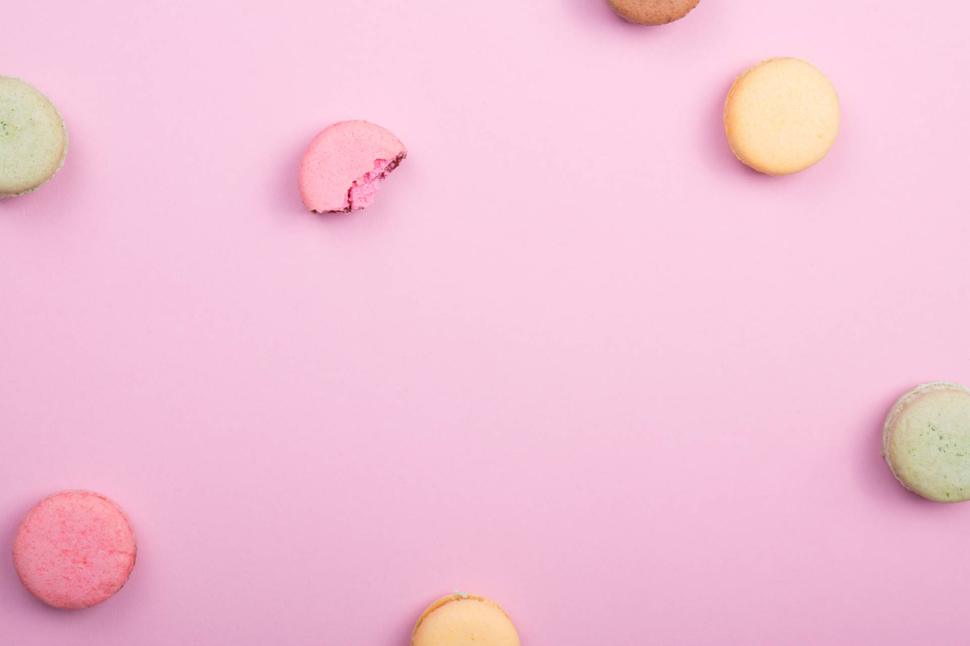 Macarons On Kawaii Pink Surface Background