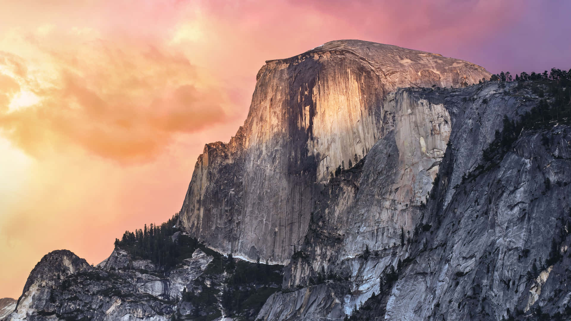Espectacularacantilado Del Parque Nacional De Yosemite Como Fondo De Pantalla Predeterminado En Macbook. Fondo de pantalla