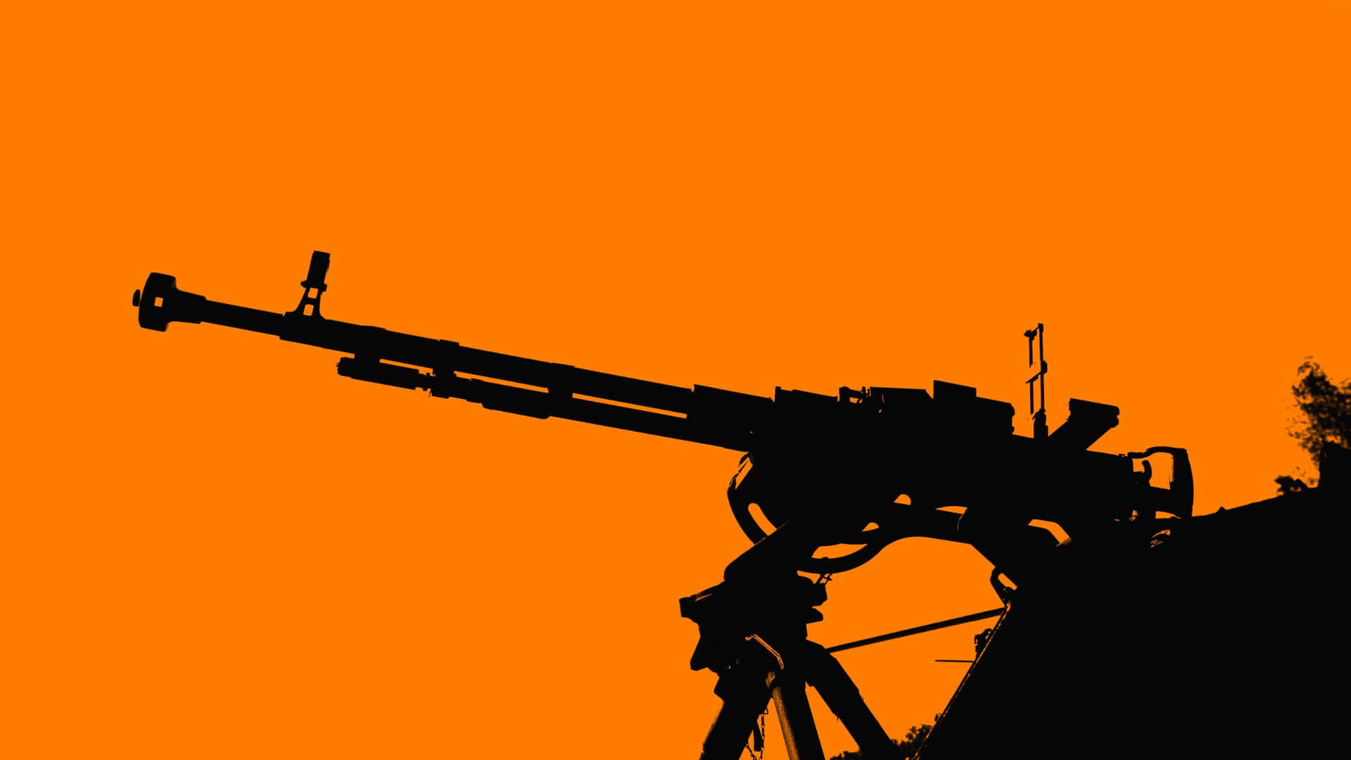 Machine_ Gun_ Silhouette_ Orange_ Background Wallpaper