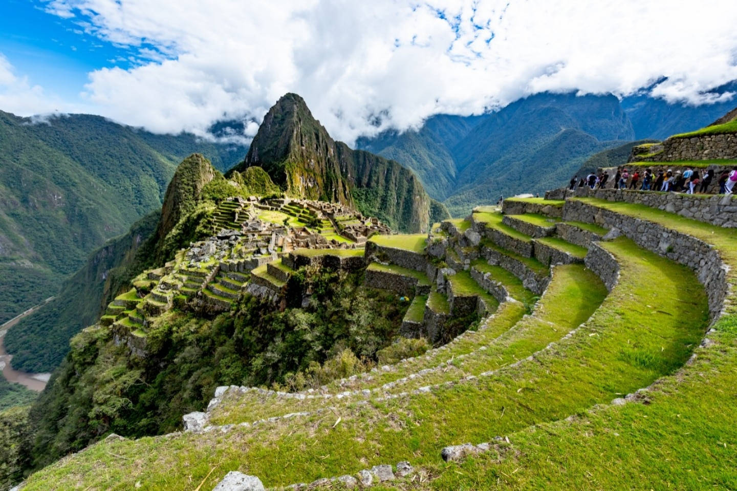 Breathtaking view of Machu Picchu ancient city on mountain steps Wallpaper