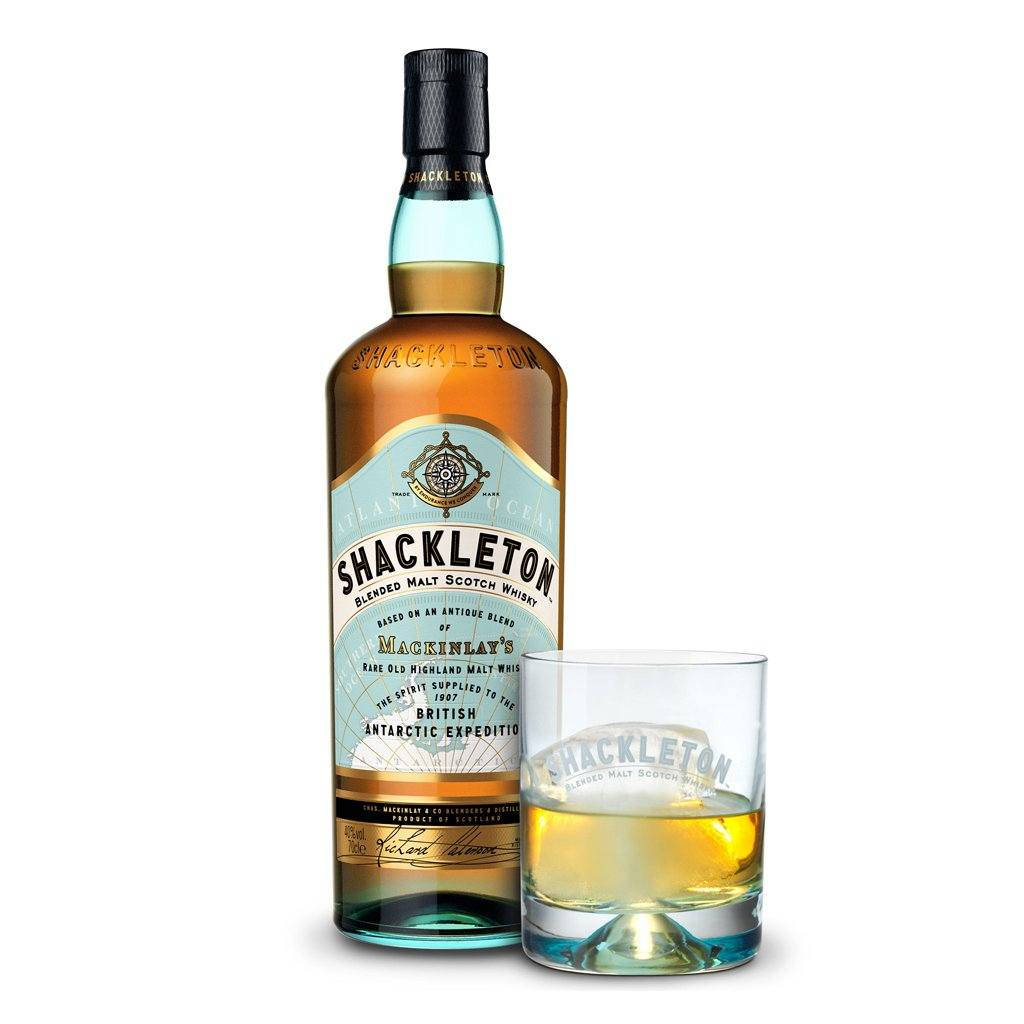 Mackinlay's Shackleton Blended Malt Scotch Whisky with a Glass Wallpaper