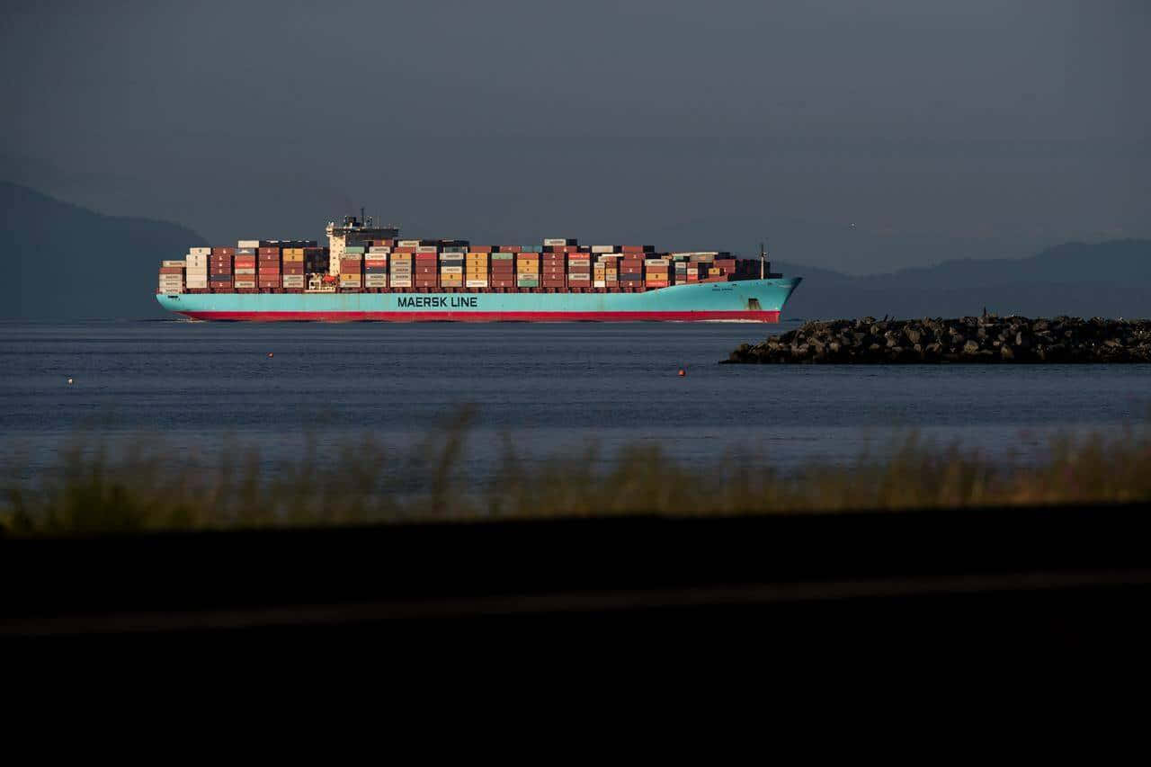 Maersk Line Cargo Shipat Dusk Wallpaper