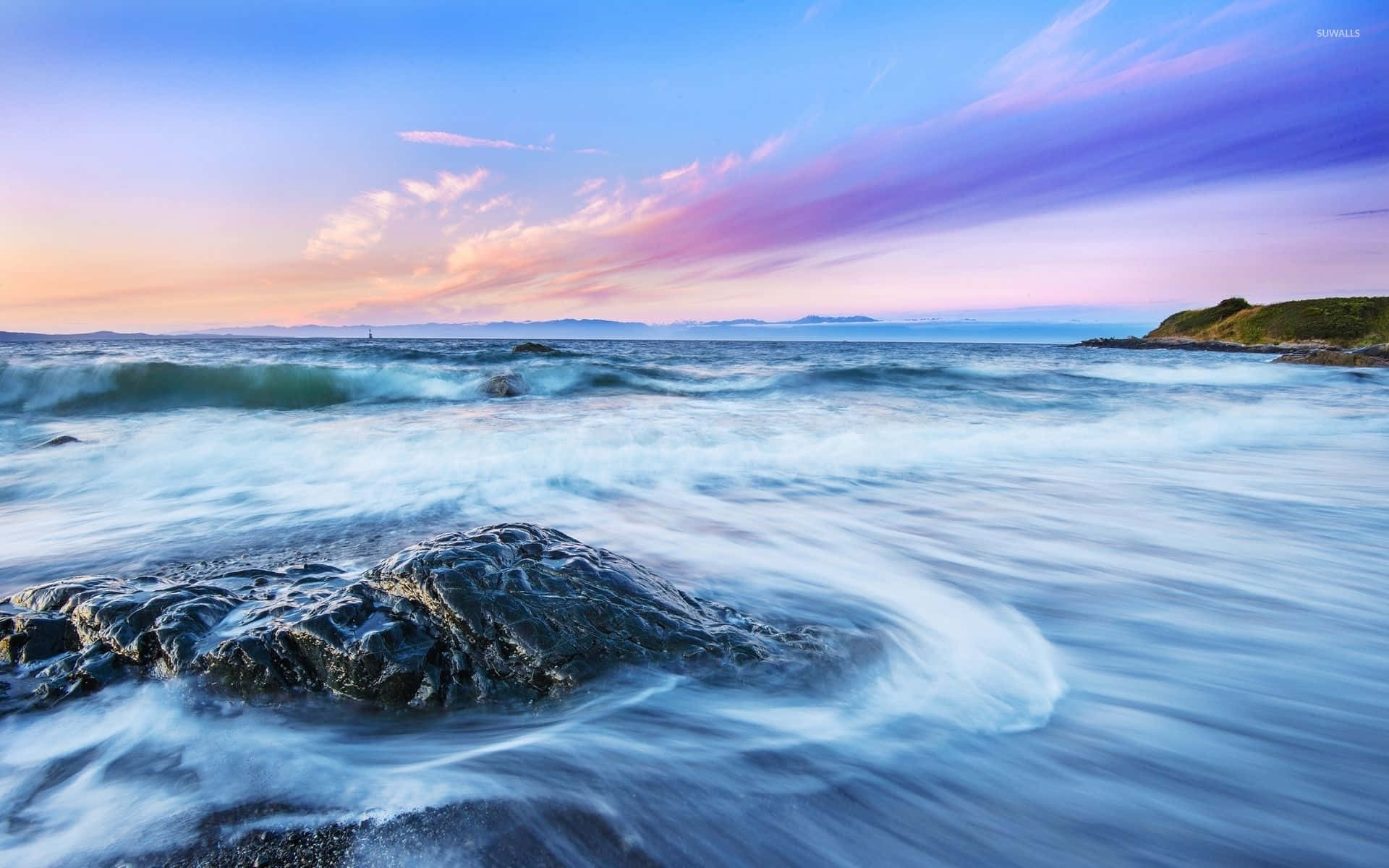 Maestoseonde Dell'oceano Al Tramonto