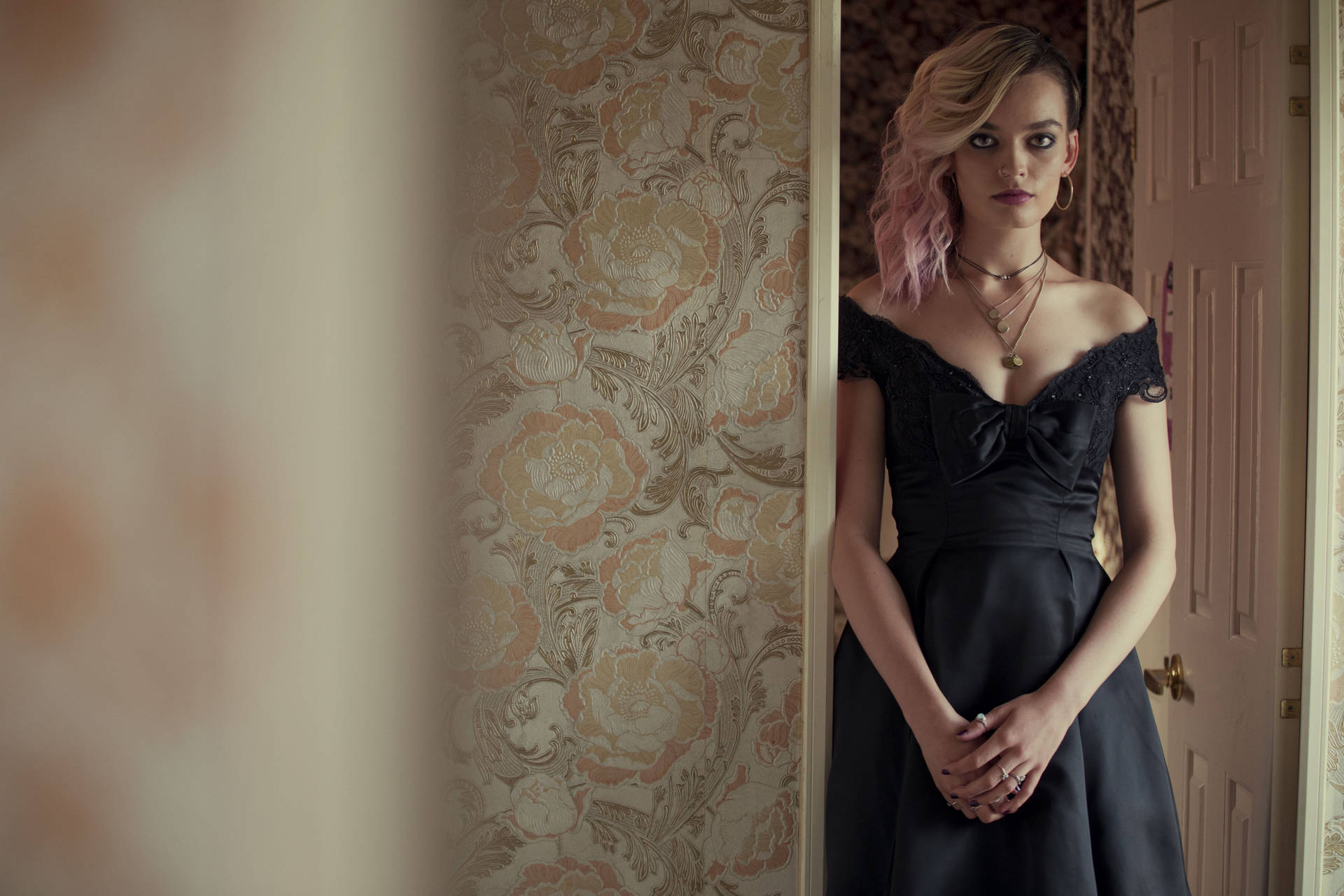 Maeve Wiley In Black Gown Wallpaper