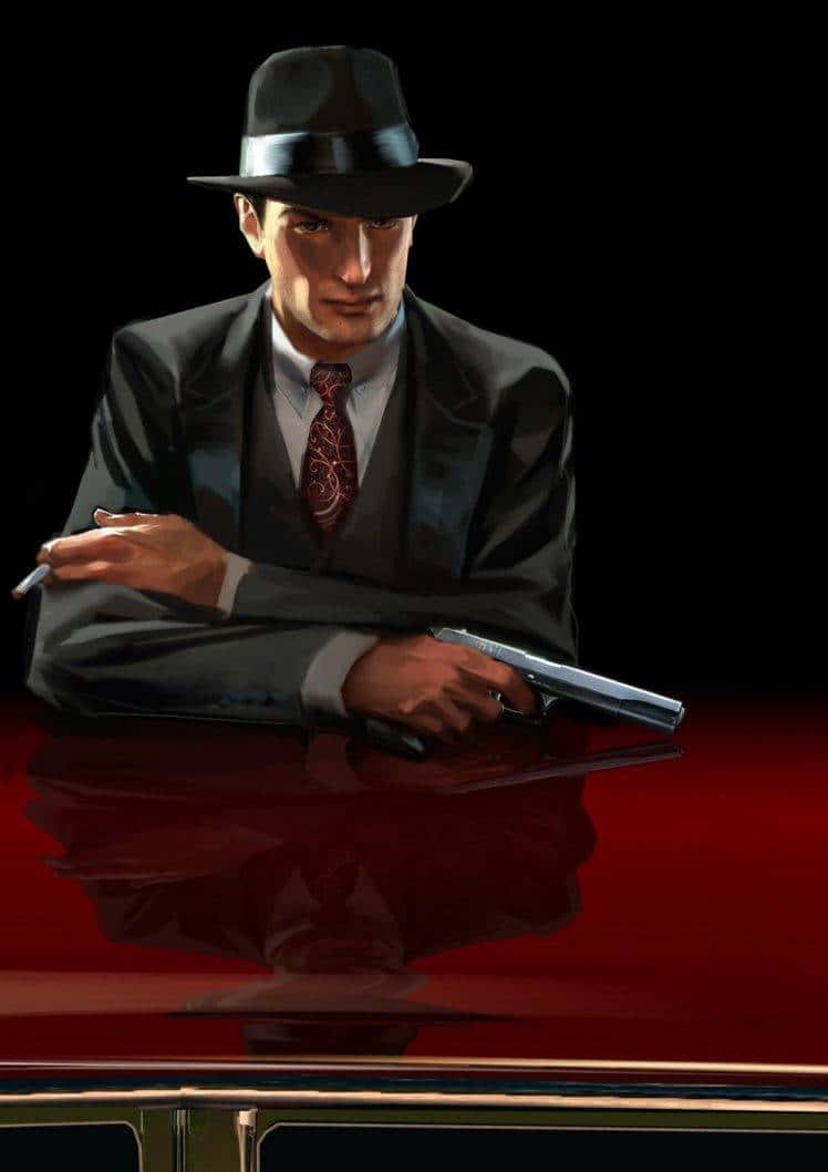 A Man In A Suit And Hat Is Holding A Gun Wallpaper