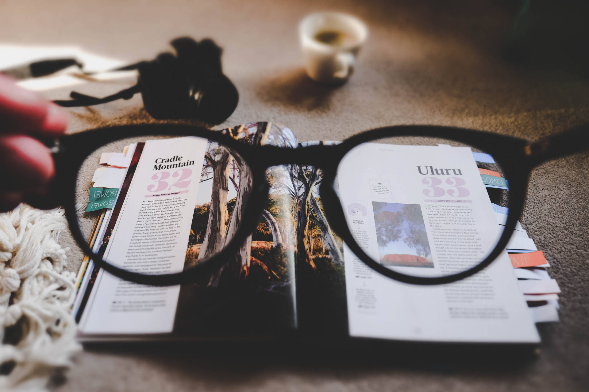 Magazine Magnified By Eyeglass Wallpaper