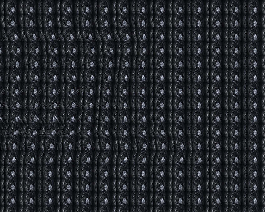 Et sort-hvidt mønster med mange prikker Wallpaper