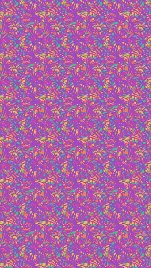 Et lilla og pink mønster med mange små prikker Wallpaper