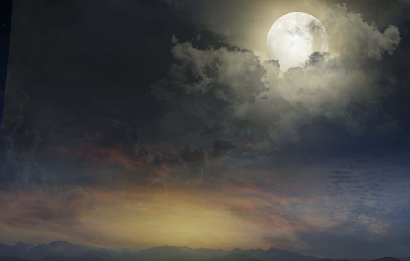 Magical Night Sky With Bright Full Moon With Large Clouds Wallpaper