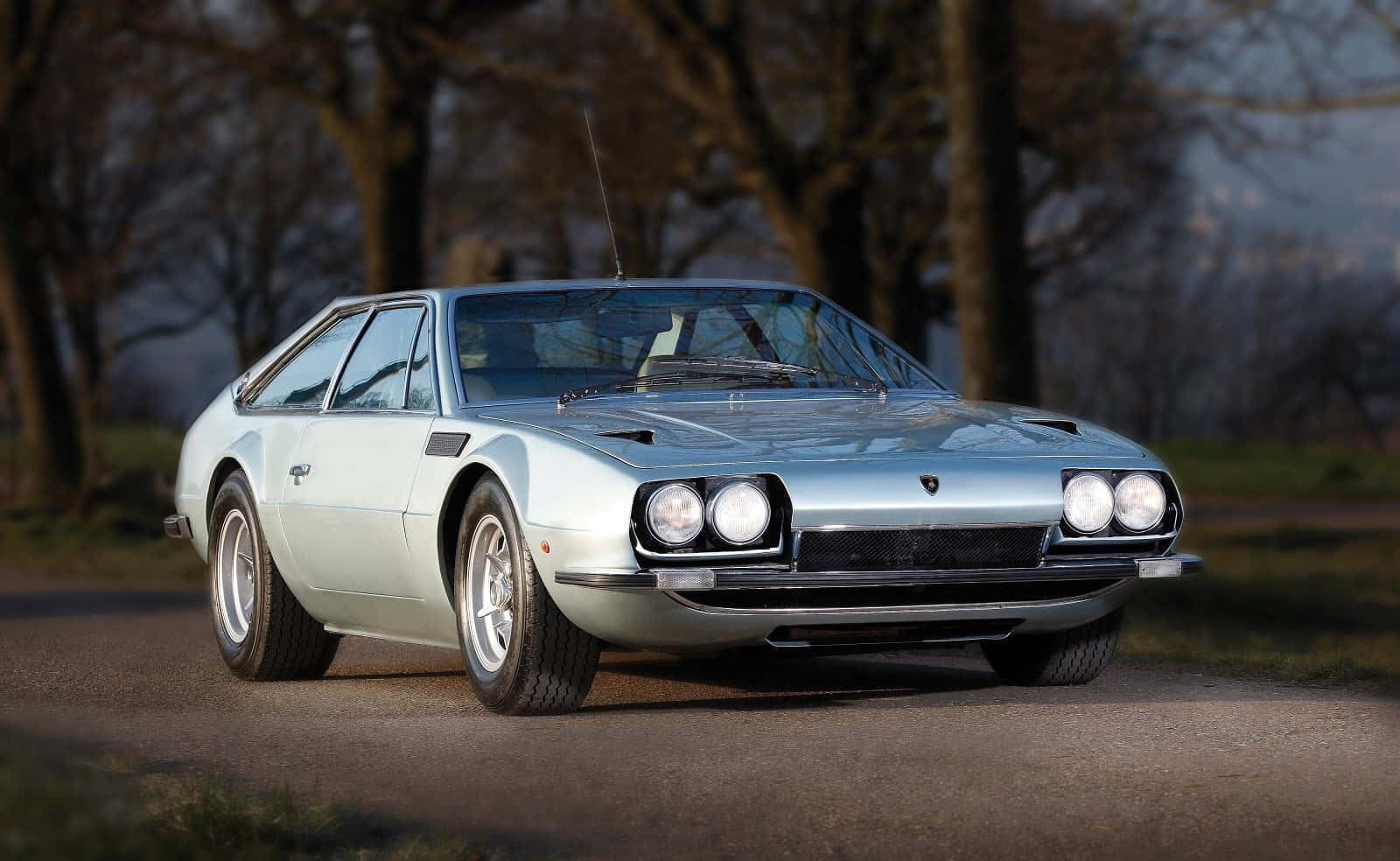 Magnificent Lamborghini Jarama On A Scenic Road Wallpaper