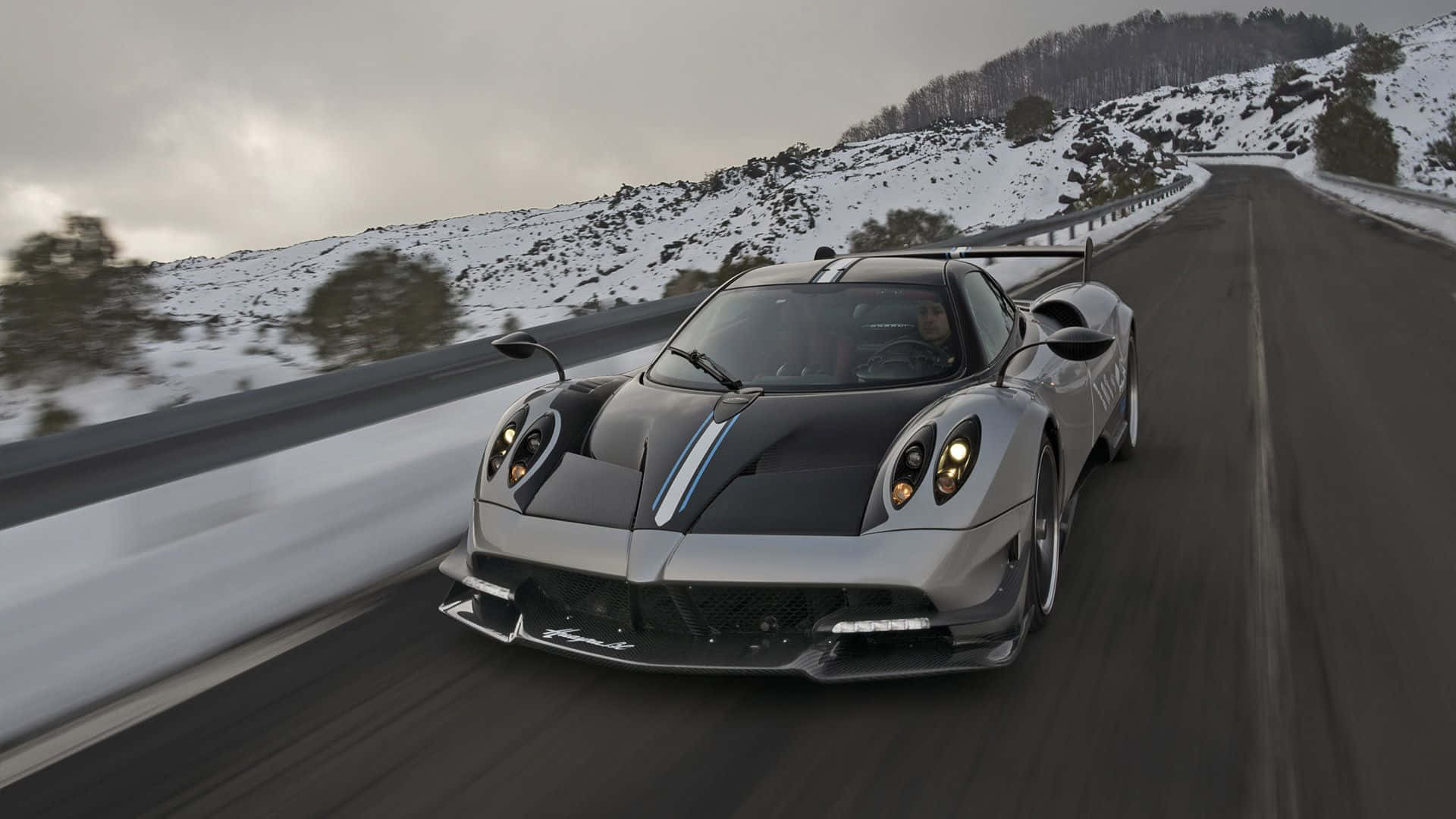 "magnificent Pagani Huayra Bc Cruising Down The Road" Wallpaper