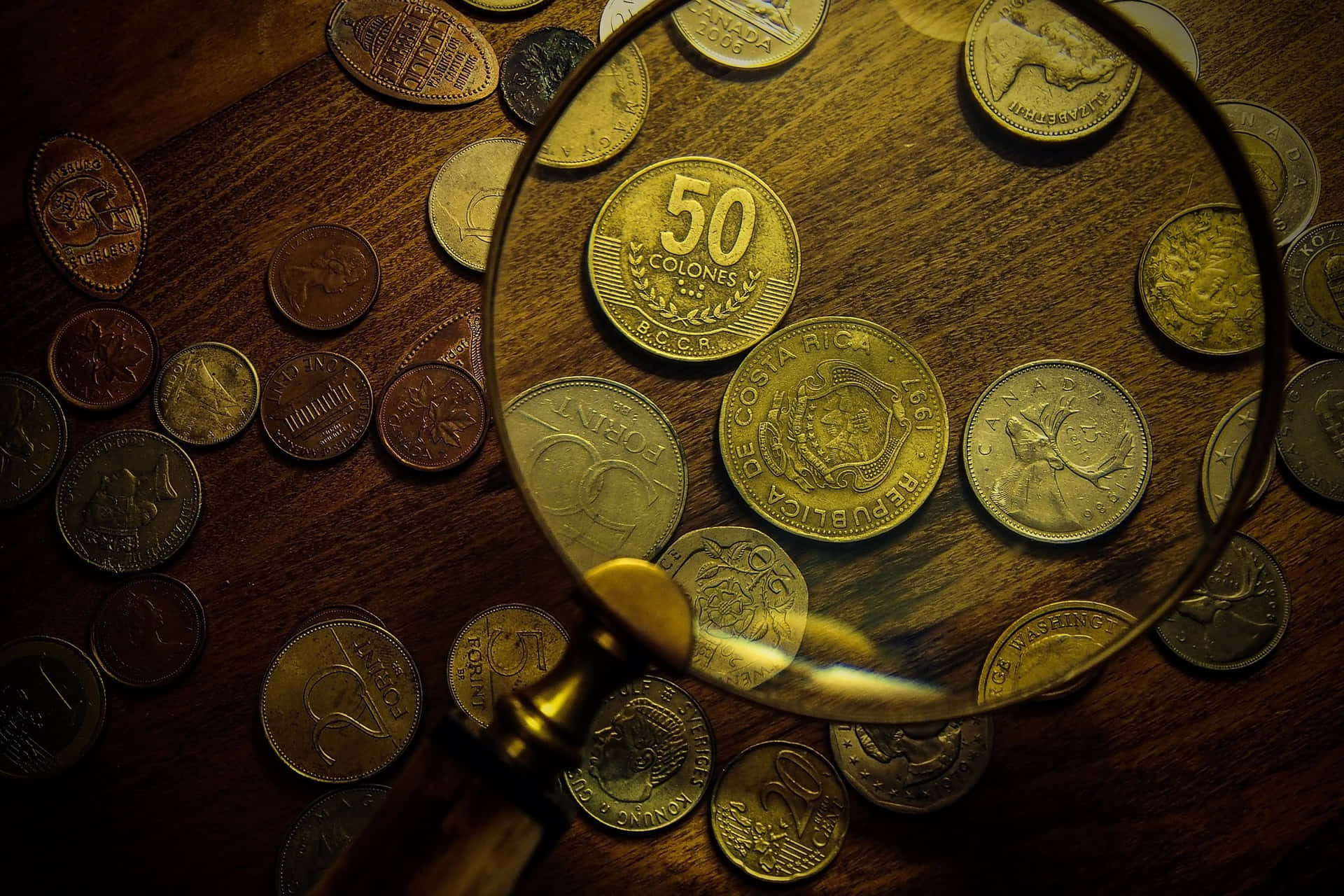 Magnifying Glass And 50 Cents Background