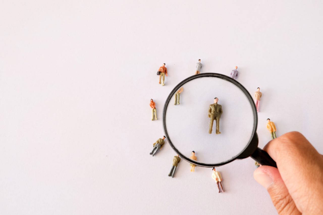 Magnifying Glassand Miniature People Wallpaper