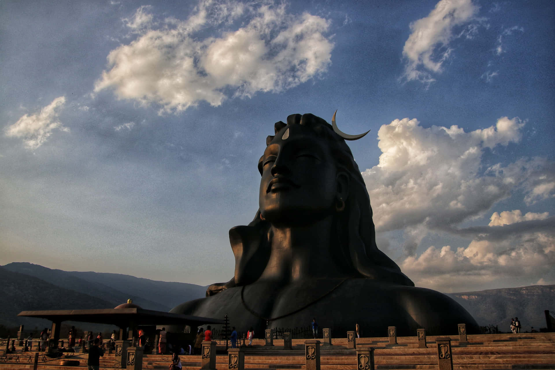 A Large Statue Of Lord Shiva In The Mountains